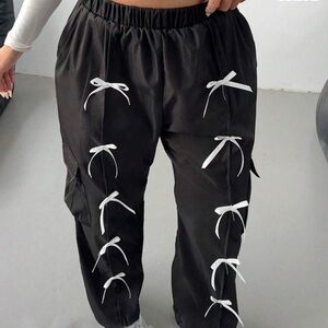 Stylish Black Pants with White Bow Accents